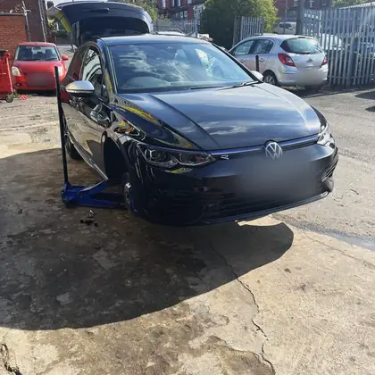 Car raised on a jack with the wheel removed during ResQ Tyres mobile tyre fitting